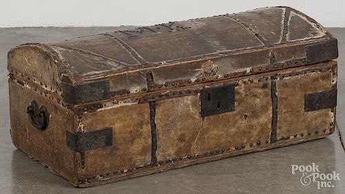 Hide covered dome top truck, early 19th c., with brass tack initials MK, 12'' h., 30'' w.
