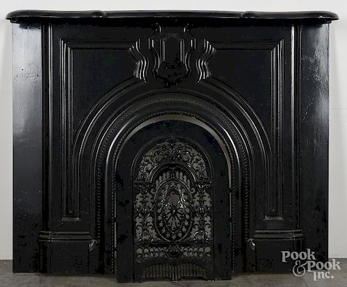 Cast iron mantel and fireplace surround, 19th c., with insert, 44'' h., 54'' w.