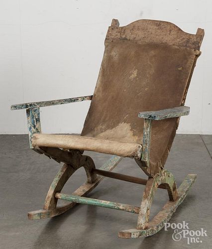 Native American Indian rocking chair, 20th c., with hide seat.