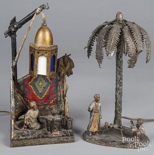 Two Austrian cold painted Arab novelty lamps, early 20th c., 13'' and 12 1/2'' h.