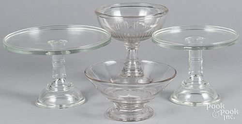 Two colorless glass compotes, 19th c., together with two cake plates, tallest - 6 1/4''.