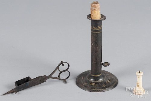 Tole painted hogscraper candlestick, 19th c., 6 1/2'' h., together with a candle snuffer and a carved