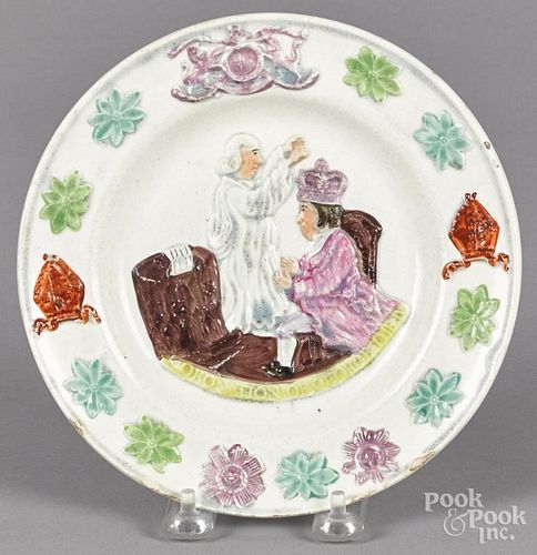 Pearlware plate, 19th c., with relief decoration of the Coronation of George the IV, 7 3/8'' dia.