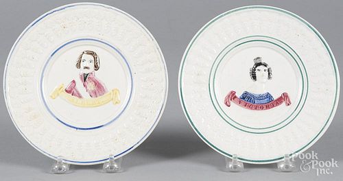 Pair of pearlware plates, 19th c., with relief decoration of Queen Victoria and Prince Albert, 7'' di