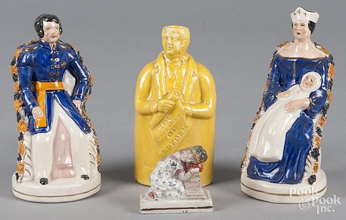 Pair of Staffordshire figures of a King and Queen, together with a small Pratt type figure of a weep