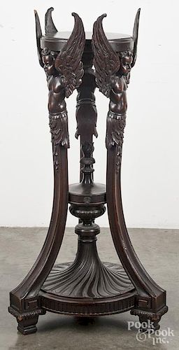 Carved mahogany pedestal, ca. 1900, with winged cherub supports, 41 1/2'' h.