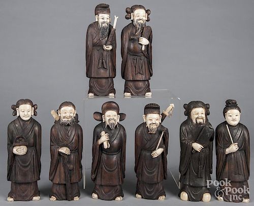 Set of eight Chinese carved ivory and hardstone immortals, 12'' h.