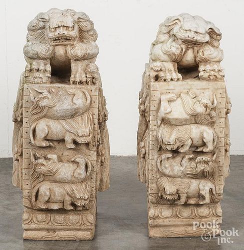 Pair of Chinese carved stone foo lions, 24'' h.