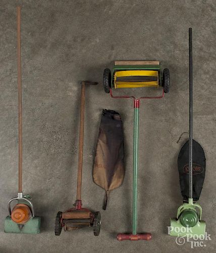 Four Arcade cast iron child's toys, to include two rotary mowers and two vacuum cleaners, tallest -