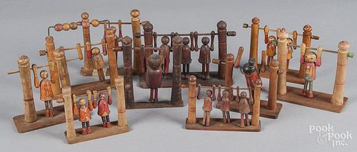 Collection of ten carved and painted wood acrobat flip toys, early/mid 20th c., animated, tallest -