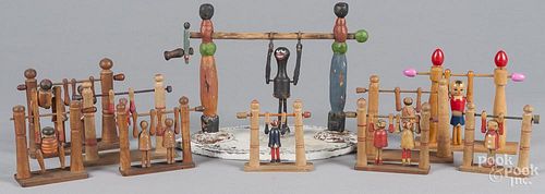 Collection of ten carved and painted wood acrobat flip toys, early/mid 20th c., animated, tallest -
