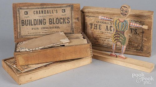 Crandall's The Acrobats, in original slide lid box, 10'' w., together with two Crandall's Building