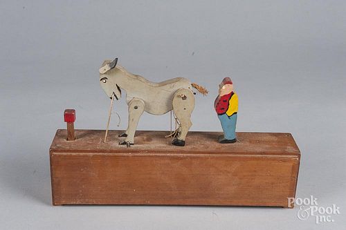 Animated painted wood toy of a mule kicking Jiggs Tyoe figure, 15 3/4'' w.