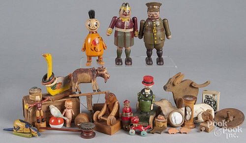 Large collection of miscellaneous wood toys, to include two Czechoslovakian figures, a goose ring to