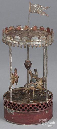 European tin clockwork musical carousel, ca. 1900, 12'' h.
