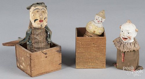 Three composition squeak toys, to include two jack-in-the-box examples, tallest - 6 1/2''.
