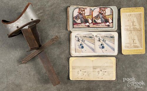 Stereoviewer with 21 viewing cards, ca. 1900.