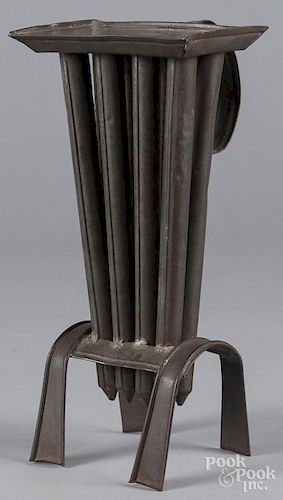 Footed tin candlemold, 19th c., 12 1/4'' h.
