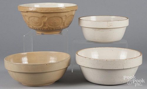 Four pottery mixing bowls, largest - 5 1/2'' h., 12'' dia.