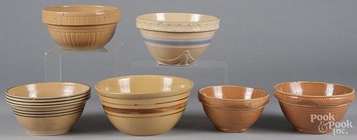 Six pottery mixing bowls largest - 5'' h., 10 1/2'' dia.