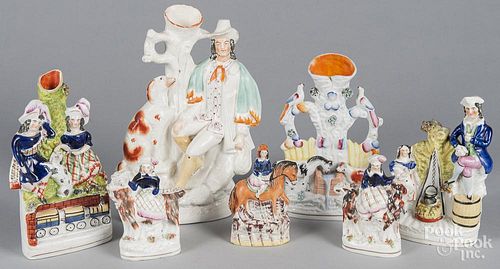 Four Staffordshire spill vases, 19th c., together with three small figures, tallest - 12 1/2''.