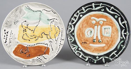 Four Pablo Picasso edition of 1993 ceramic chargers, 14 1/4'' dia.