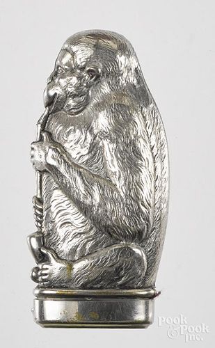 Nickel plated figural monkey with a pipe match vesta safe, 2 3/4'' h.