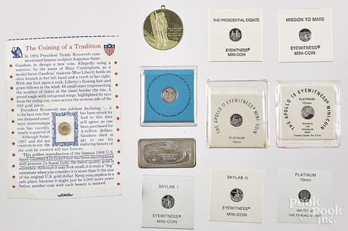 Group of Franklin Mint space related collector coins, to include seven platinum 10mm coins, 18K yell