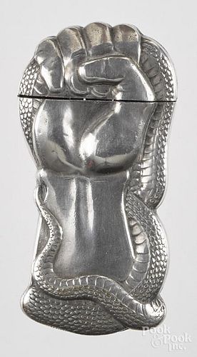 Silver plated match vesta safe, of a clinched fist wrapped in a cobra snake, 2 3/4'' h.