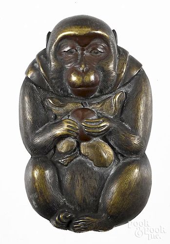 Japanese mixed metal figural monkey holding a persimmon match vesta safe, 2 1/2'' h.