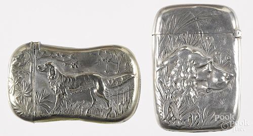 Two embossed hunting dog match vesta safes, to include a Gorham sterling silver example with bust of