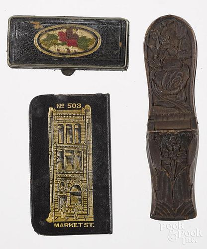 Three miscellaneous match vesta safes, to include a floral carved wooden shoe, 4'' l., a leather exam