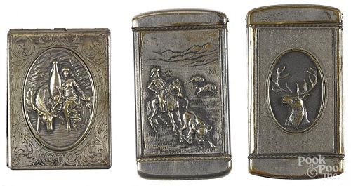 Three nickel plated advertising match vesta safes, to include one with high relief elk, inscribed on