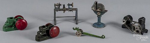 Two Arcade cast iron Fairbanks Morse toy engines, 4'' l., together with a Plank steam toy grinding