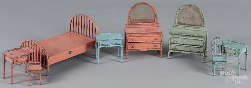 Eight pieces of Arcade cast iron dollhouse bedroom furniture, tallest - 6 1/2''.