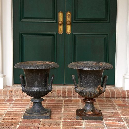 Pair old black painted cast iron garden urns
