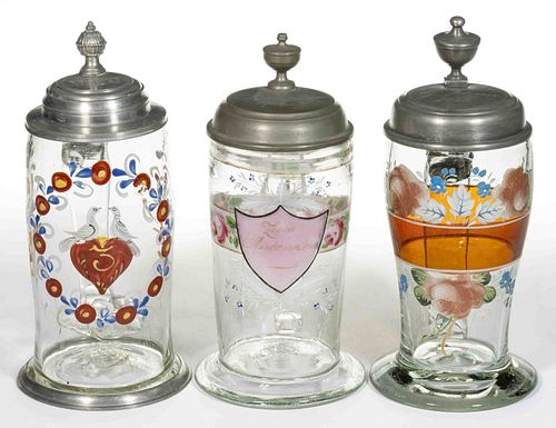 EUROPEAN BLOWN AND DECORATED GLASS STEINS, LOT OF THREE