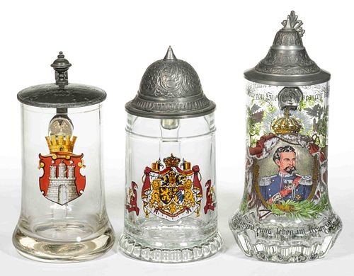 EUROPEAN ARMORIAL ENAMEL-DECORATED GLASS STEINS, LOT OF THREE