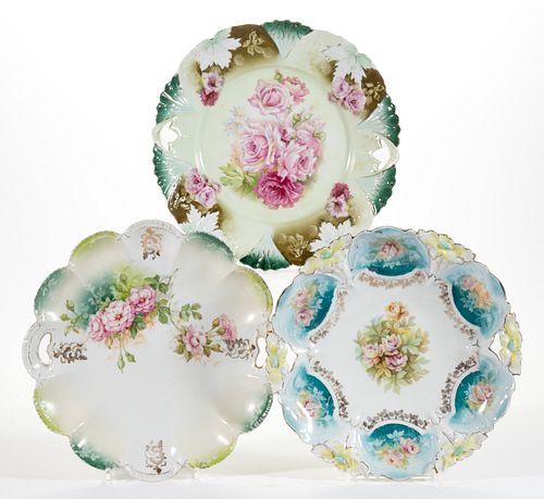 R.S. PRUSSIA PORCELAIN FLORAL MOTIF CAKE PLATES, LOT OF THREE