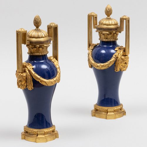 Pair of Louis XVI Style Ormolu-Mounted Sevres Style Cobalt Porcelain Covered Urns