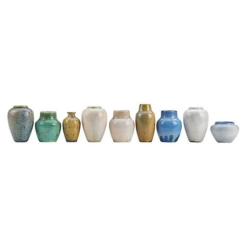 ADELAIDE ROBINEAU Nine small cast glaze test vases