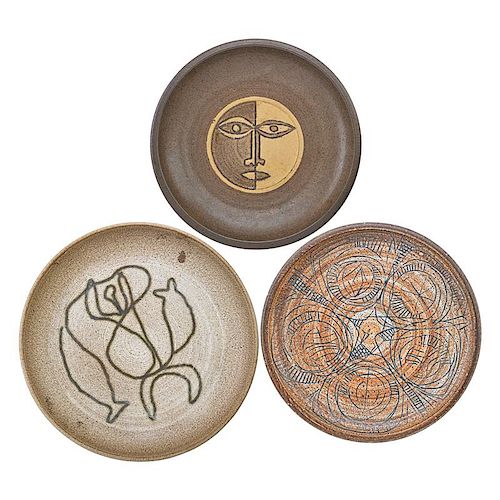 CLYDE BURT Three stoneware plates