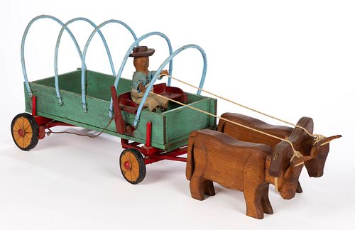 AMERICAN FOLK ART CARVED AND PAINTED COVERED OX WAGON