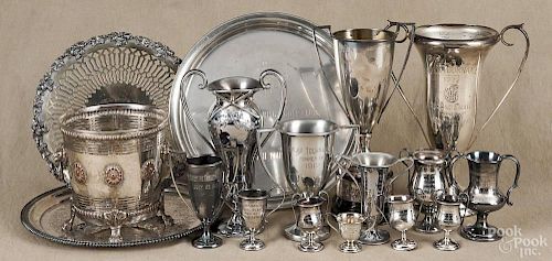 Collection of silver plated golf trophies and plaques.
