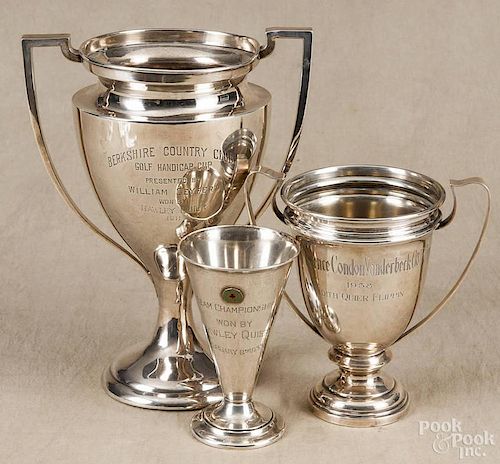 Three sterling silver golf trophies tallest - 11 1/2'', 36.4 ozt.