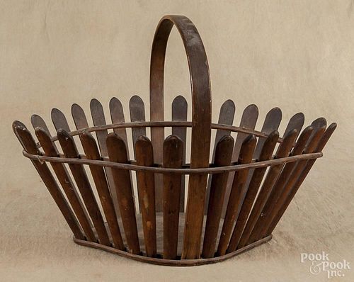 Picket fence basket, late 19th c., 11 1/2'' h., 16 1/2'' w.