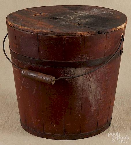 Painted pine lidded bucket, late 19th c., retaining its original red surface