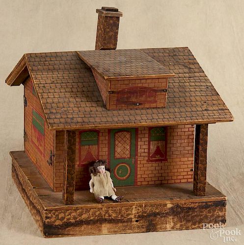 Painted wood doll house, early 20th c., 14 1/2'' h., 13'' w., together with a small bisque doll