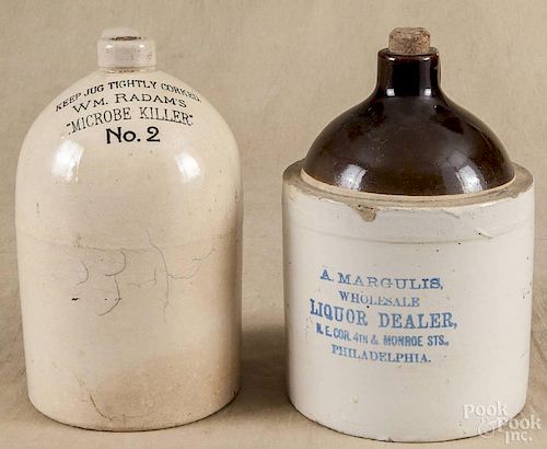 Two stenciled stoneware jugs, early 20th c., one inscribed A. Margulis Wholesale, Liquor Dealer