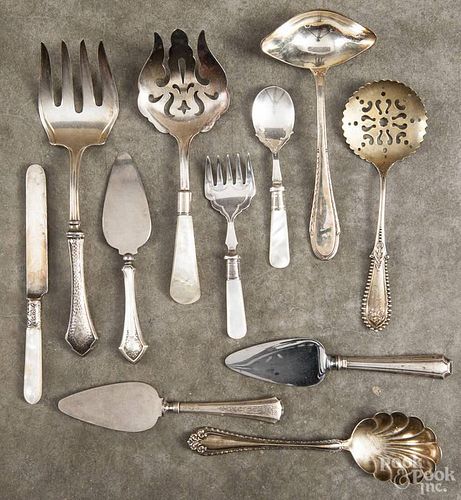 Sterling silver, plate, and sterling mounted flatware.